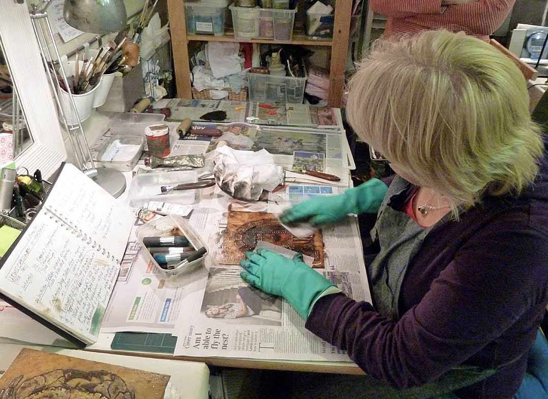 3. Wiping back the intaglio ink with scrim & tissue